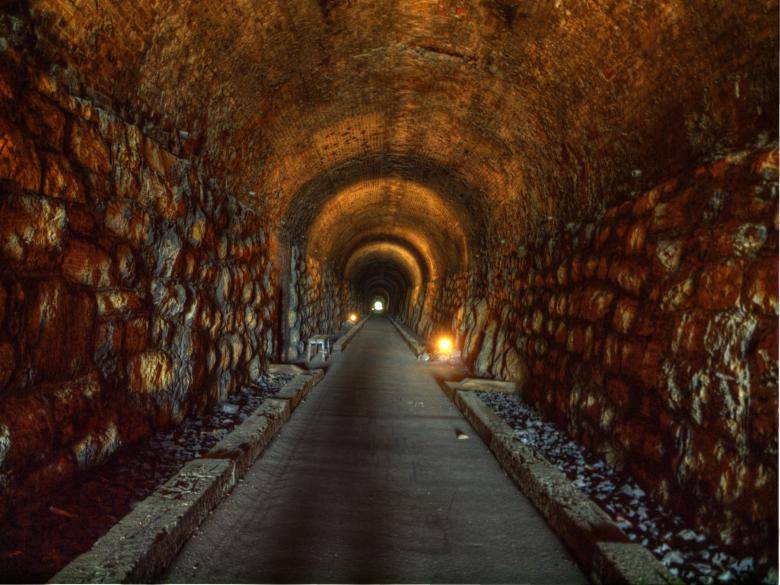 Dark railroad tunnel